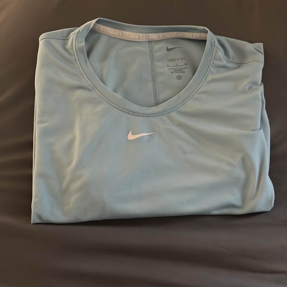 A blue nike shirt